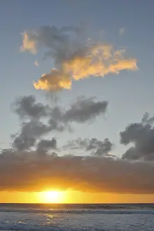 Evening Backlight Shot Prints: Sunset and clouded sky at the Atlantic Ocean