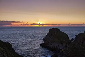 Backlit Landscape Photography Prints: Sunset behind clouds on the Atlantic Ocean