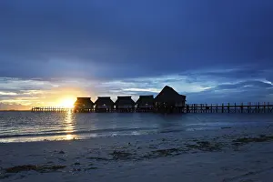 Atmospheric Light On The Shore Prints: Sunset with clouds on the Kae beach