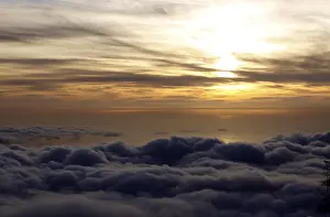 Sunset Over Atlantic Ocean Prints: Sunset over the clouds, the sea at back