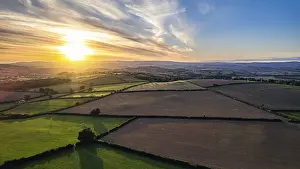 Atmospheric Evening Light UK Prints: Sunset over Devon Fields, Berry Pomeroy