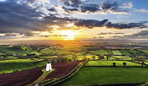 Drone Photography UK Landscape Prints: Sunset of Devon Windmill over Fields and Farms from a drone