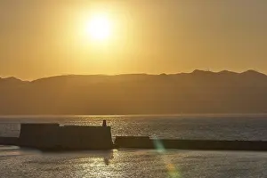 Prints of Sunset, evening light, backlight, Venetian sea fortress, Koules, Morosini, mountains, bronze sky, harbour, Heraklion, capital, island of Crete, Greece Heraklion Prints: Heraklion Harbour at Sunset Print, Crete, Greece