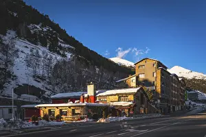Prints of Sunset light illuminating bars, restaurants and residential building in El Tarter and Soldeu town. Ski winter holidays in Andorra, Pyrenees Mountains Andorra Prints: El Tarter and Soldeu at Sunset - Print