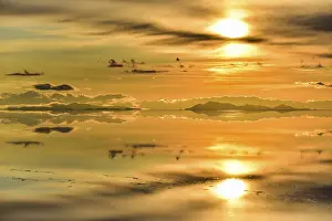 Salar De Uyuni Bolivia Prints: Sunset, mountains with reflection in the lake
