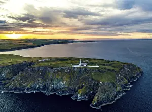 Evening Atmosphere Scotland Prints: Sunset over Mull of Galloway Lighthouse from a drone