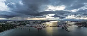 UNESCO World Heritage Site Panorama Prints: Sunset Panorama of Rain clouds over Forth Bridge from a drone