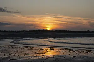 Deserted North Sea Coast Prints: Sunset on a quiet beach with soft light on the waves