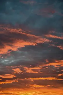 Deserted Evening Sky Germany Prints: Sunset with red illuminated clouds, Germany