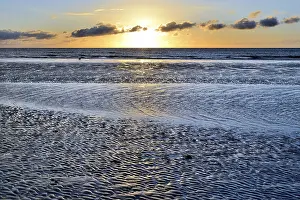 Northern German Beaches Prints: Sunset on sandy beach with wave-like structures