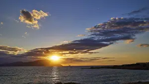 Sunset Over The Sea Prints: Sunset over the sea with clouds