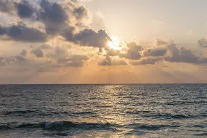 Deserted Evening Sea View Prints: Sunset over the sea, clouds with sunrays