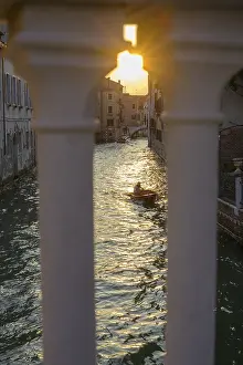 UNESCO World Heritage Site Image Prints: Sunset seen through a bridge railing