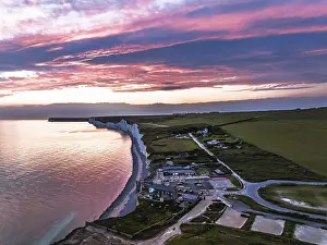 English Channel Coastline Prints: Sunset over Seven Sisters Cliffs from a drone