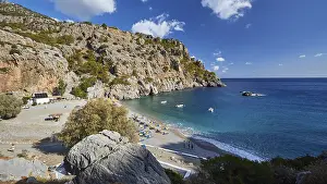 Greek Islands Landscape Prints: Sweeping view over a bay with rocks
