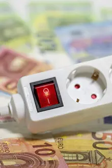 Electricity Costs Prints: Switchable socket strip, euro banknotes