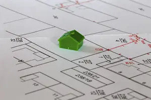 Model House Prints: Symbolic image of building: Model house on a development plan