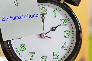 Alarm Clock Close Up Prints: Symbolic image time change, winter time: close-up of an alarm clock set to two o'clock Symbolic image time change