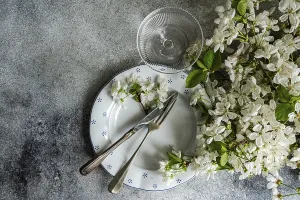 Vintage Home Decor Inspiration Prints: A table setting features vintage cutlery on a patterned plate