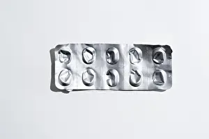 White Background Packaging Prints: Empty tablet blister pack against white background