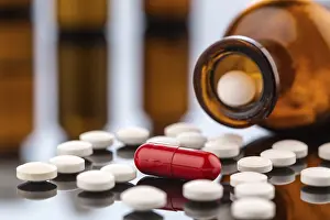 Austrian Healthcare System Prints: Many tablets with a glass container