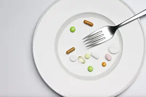 Weight Loss Symbol Prints: Tablets on a plate with a fork