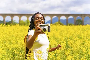 Vintage Camera Photos Prints: Taking photos smiling with a vintage camera