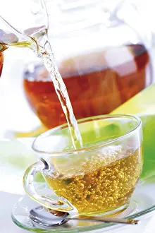 Studio Shot Of Tea Prints: Tea poured into a cup