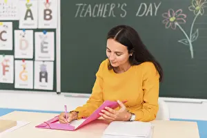 Classroom Learning Prints: Teacher taking notes class
