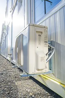 Technical Close-up Print of Air Conditioning on Container Wall