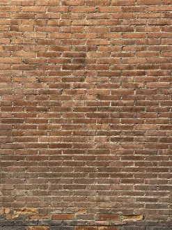 Urban Exterior View Prints: A textured red brick wall with a consistent horizontal pattern