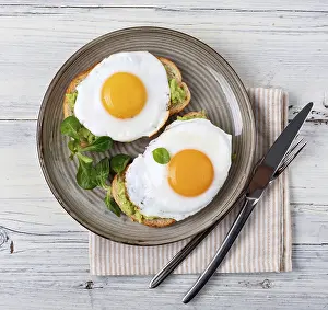 White Bread Nutrition Facts Prints: toast with fried egg, top view