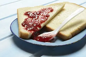 Cute Food Photography Prints: Toast with raspberry jam on a plate, breakfast