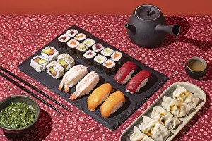 Asian Gastronomy Prints: Top-down view of an elegant sushi dinner