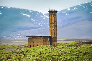 Ancient Turkish Architecture Prints: Tower structure with mountains background