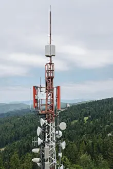 Telecommunication Equipment Prints: A towering communication array equipped with various antennas and dishes