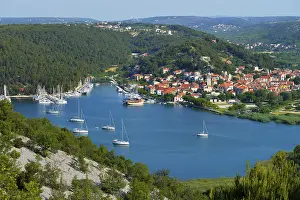 Prints of Townscape with sailing ships in the foreground, River Krka, Skradin, Dalmatia, Croatia River Prints: Townscape with Sailing Ships Print, River Krka, Croatia