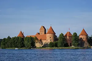 Prints of Trakai Island Castle in lake Galve with boats in summer day, Lithuania. Trakai Castle is one of major tourist attractions of Lituania Lake Prints: Trakai Island Castle Print, Lithuania