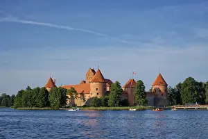 Prints of Trakai Island Castle in lake Galve with boats and yachts in summer day with beautiful sky, Lithuania, Trakai Castle is one of major tourist attractions of Lituania Lake Prints: Trakai Island Castle Print, Lithuania