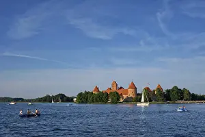 Prints of Trakai Island Castle in lake Galve with boats and yachts in summer day with beautiful sky, Lithuania. Trakai Castle is one of major tourist attractions of Lituania Lake Prints: Trakai Island Castle Print, Lithuania