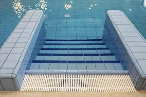 Serene Ocean Views Prints: Tranquil pool steps gently leading into the refreshing