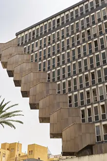 Prints of Tunis, Tunisia. 16th May 2024 The 1970s Brutalist style architecture of the Hotel du Lac, with unique inverted pyramid shape and cantilevered stairs stands awaiting its fate in Tunis, Tunisia Brutalist Architecture Prints: Tunis, Tunisia: Hotel du Lac Print