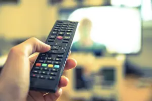 Deserted Architecture Prints: TV remote control in the foreground