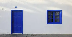 Arrecife Cityscape Prints: Typical architecture with whitewashed wall and blue windows