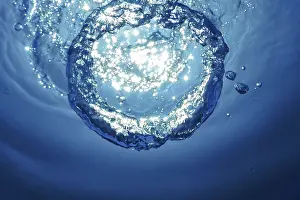 Deserted Ocean Scene Prints: Underwater Bubble Ring Ascends towards the Sun