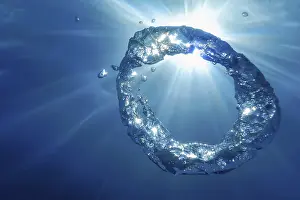 Deserted Water Scene Prints: Underwater Bubble Ring Ascends towards the Sun