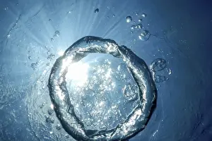 Deserted Underwater Scene Prints: Underwater Bubble Ring Ascends towards the Sun