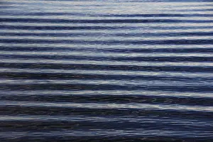 Deserted Lakeside Scene Prints: Uniform water waves, reflection