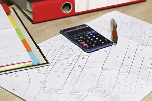 Urban Development Plan Prints: Urban development plan on a desk