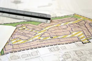 Urban Development Plan Prints: Urban development plan on a desk